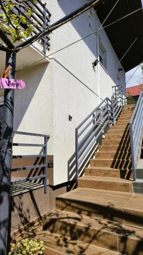 a group of stairs in front of a building at Pure Sky Apartments - with pool in Mostar