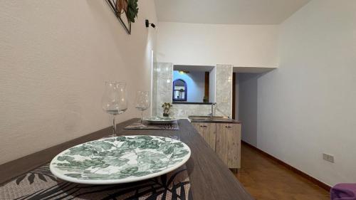 a dining room with a table with a plate on it at Casa Vacanze "La Casetta" in Configni