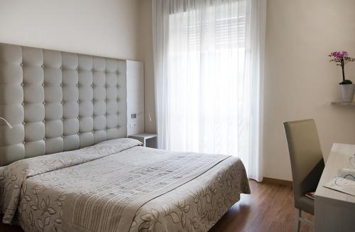 Postel nebo postele na pokoji v ubytování Primavera