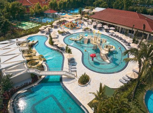 an aerial view of a pool at a resort at Paradisus by Meliá Bali in Nusa Dua