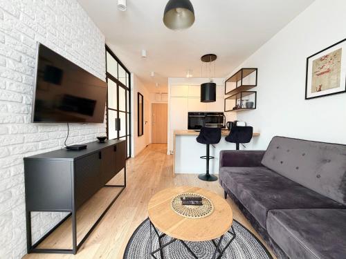 Street Art Loft Apartment by BookingHost