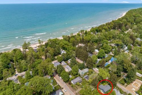 an aerial view of a house on the beach at Nan's Escape by Juniper Holiday + Home in Union Pier