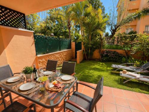 Marbella Dunas de Cabopino 2BR Apartment with Private Garden, Pool & Parking - Magnolia Properties