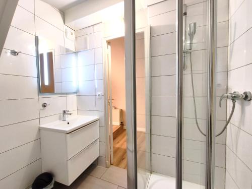 a bathroom with a sink and a shower at Mistral Studio in Cassis