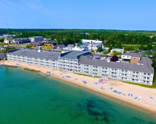 an aerial view of a hotel on the beach at Hamilton Inn Select Beachfront in Mackinaw City
