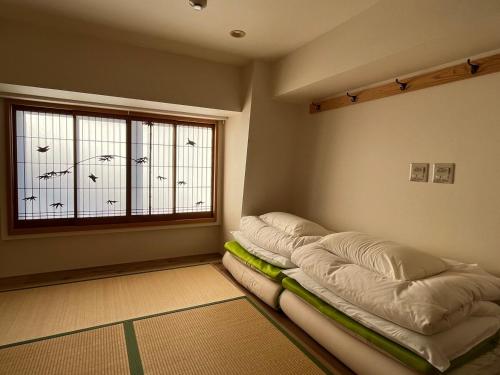 NAGAMORIYA 30 seconds on foot from Shin-Osaka Station Free Wi-Fi