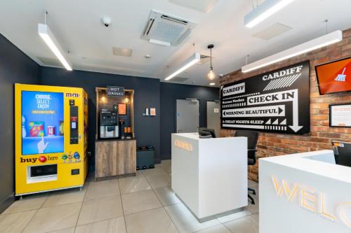 a lobby with a check in machine in a store at easyHotel Cardiff in Cardiff