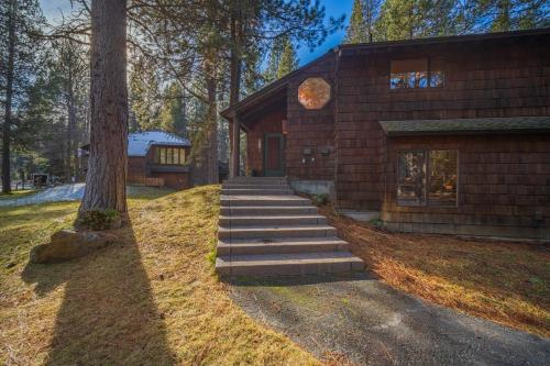 a house with stairs leading up to a building at 61 Wildflower in Sunriver