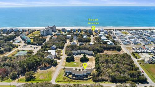 an aerial view of a beach area with hot air balloons at The Crabby Seahorse in Emerald Isle