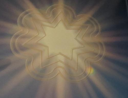 a close up of a white star with rays at Sportpension Alpenrose in Schladming