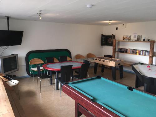 TV o dispositivi per l'intrattenimento presso Hestkær Family Rooms Summer Camp