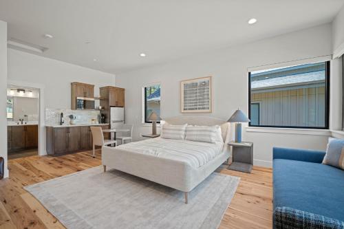 a living room with a bed and a kitchen at 18157-2 Forestbrook Loop in Bend