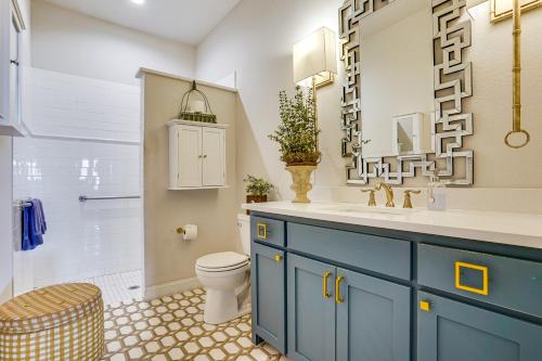 a bathroom with a blue cabinet and a sink at Backyard Bungalow w/ Pool & Country Views in Argyle