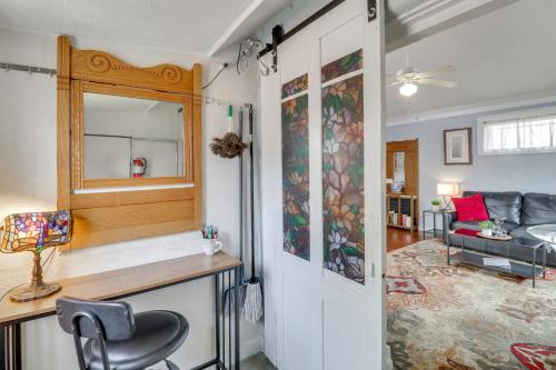 a living room with a table and a chair at Walk to Downtown! ABQ Couple's Studio w/ Deck in Albuquerque