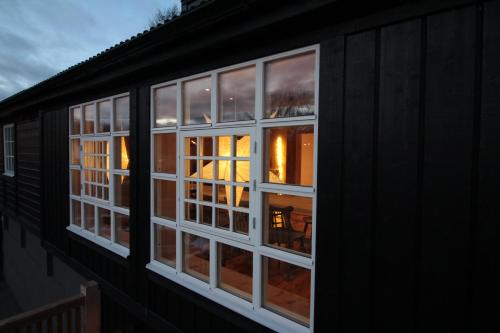 a window of a house with a view of a building at Davids Kulle in Ronneby