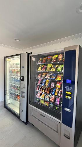 a refrigerator with food inside of a store at Rodeway Inn San Diego South San Ysidro Border in San Ysidro