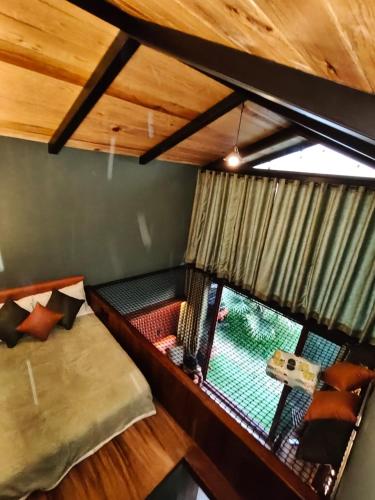 an overhead view of a room with two bunk beds at Cabañas La Cascada in Tepoztlán