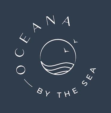 a sign with a smile and the words know by the sea at Oceana by the Sea in Point Pleasant Beach