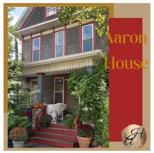 an image of a home with a red house at Aaron House of Niagara Falls in Niagara Falls