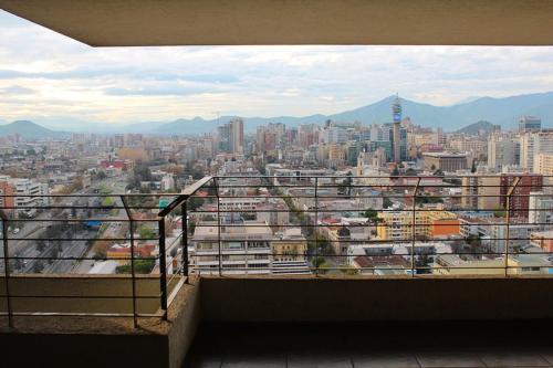 a view of a city from a balcony at Apartment Las Heras in Santiago