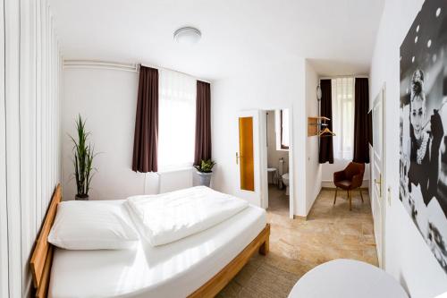 Cama ou camas em um quarto em Zur Saale