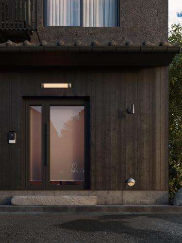 a window on the side of a building at Tonoda Guesthouse Kyoto 殿田宿 Private 2-Story Home in Kyoto