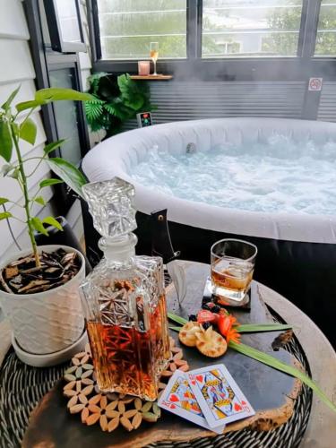 a table with a jacuzzi tub in a room at Hidden Gem - St Mary's in Saint Marys