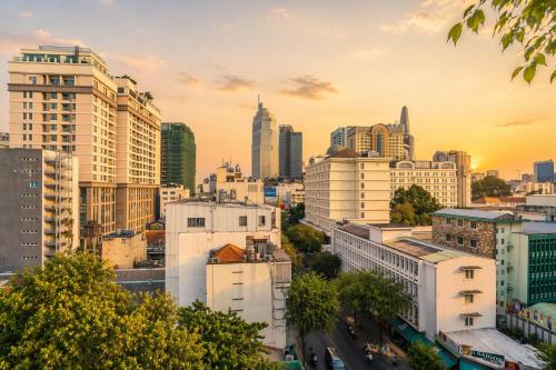 a view of a city skyline with buildings at Golden Star Hotel in Ho Chi Minh City