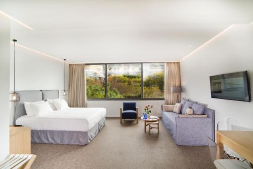 Posteľ alebo postele v izbe v ubytovaní NLH FIX | Neighborhood Lifestyle Hotels