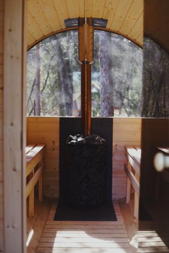 an inside view of a sauna with two benches at Dom przy Lesie z sauną in Augustów