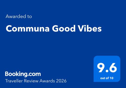a blue screen with the words comuna good villages at Communa Good Vibes in Tbilisi City