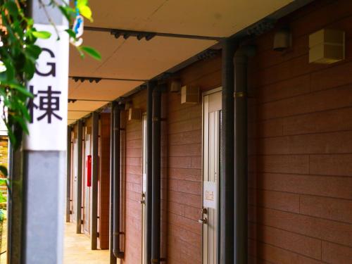a row of columns on the side of a building at House&Cafe GreenTerrace in Ishigaki Island