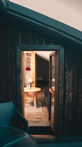 a view of a room with a table and a window at Ekofarma Selwit in Sosnówka