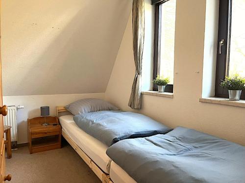 Llit o llits en una habitació de Finnhaus Brizi