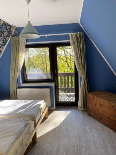 Llit o llits en una habitació de Finnhaus Hanni