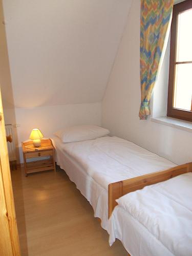 Llit o llits en una habitació de Finnhaus Brigitte