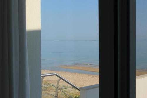 a view of the beach from the balcony of a house at Dimore di Mare in Termoli