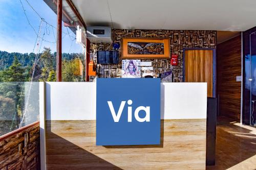 a sign that says vita in front of a building at Via Neilkanth in Dhanaulti