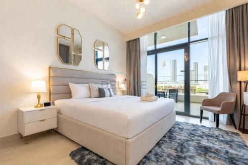 Cozy Modern Studio Just A Quick Drive from Meydan Racecourse, Azizi Riviera 20, Al Merkadh by Deluxe Holiday Homes