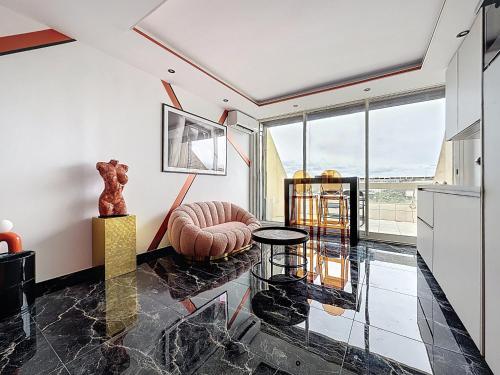 Studio luxe L'Aphrodite C49 avec terrasse vue mer au village naturiste Héliopolis