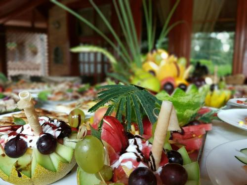 a table with a bunch of different types of food at Vila Dincic doo in Veliko Gradište
