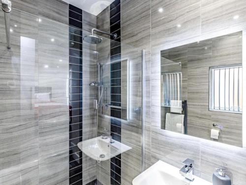 a bathroom with a sink and a mirror at 2 Bed in Ellesmere oc-62544 in Ellesmere