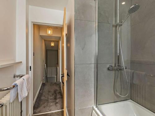 a bathroom with a shower and a bath tub at 2 Bed in Grange-over-sands oc-89206 in Cartmel