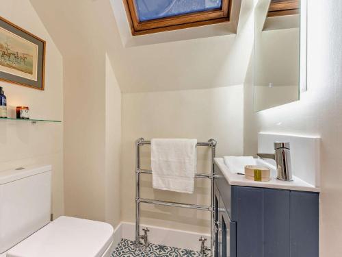 a bathroom with a toilet and a sink at 1 Bed in Duns oc-95832 in Duns