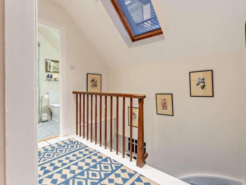 a staircase in a house with a skylight at 1 Bed in Duns oc-95832 in Duns