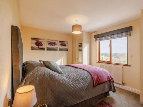 a bedroom with a bed and a window at 1 Bed in Northwich oc-91266 in Whitegate