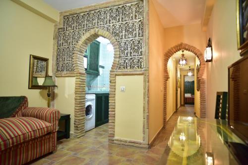 Posedenie v ubytovaní Apartamentos Boutique Doña Maria La Brava