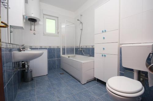 Kúpeľňa v ubytovaní Apartments Beverly
