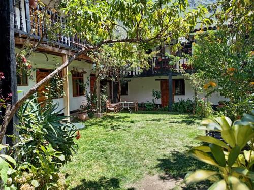a view of the yard of a house at Las Orquideas Ollantaytambo IN in Ollantaytambo