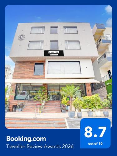 a building with a sign on the front of it at Palette by CheckIn Patel Nagar Bhopal in Bhopal